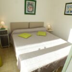 Amelie les bains location daviaud, photo de la chambre du T2 n°B7bis. Cette location se trouve à 100 mètres des thermes.
