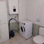 Salle d'eau de l'appartement F2 n°310 avec lave linge